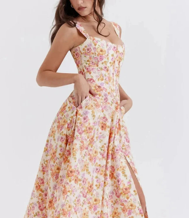 Side view of floral midi dress with fitted bodice and slit skirt, a stylish wedding guest dress