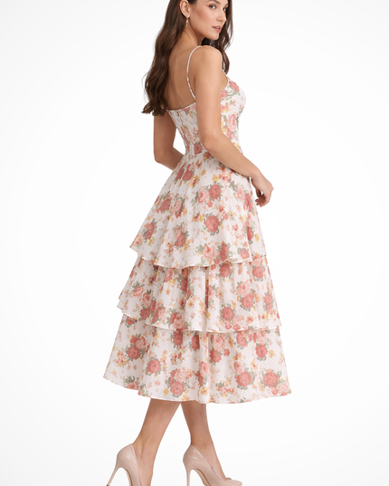 Side view of floral midi dress showing tiered skirt and spaghetti straps