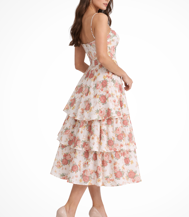 Side view of floral midi dress showing tiered skirt and spaghetti straps