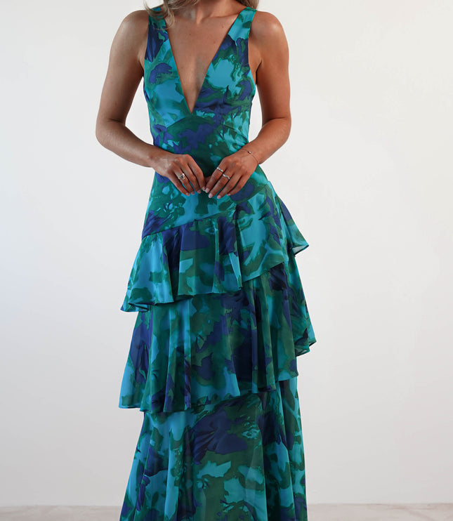 Front view of teal blue floral v-neck maxi dress with layered ruffle tiers