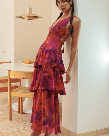 Red and purple floral tiered ruffle maxi dress with v-neckline side view