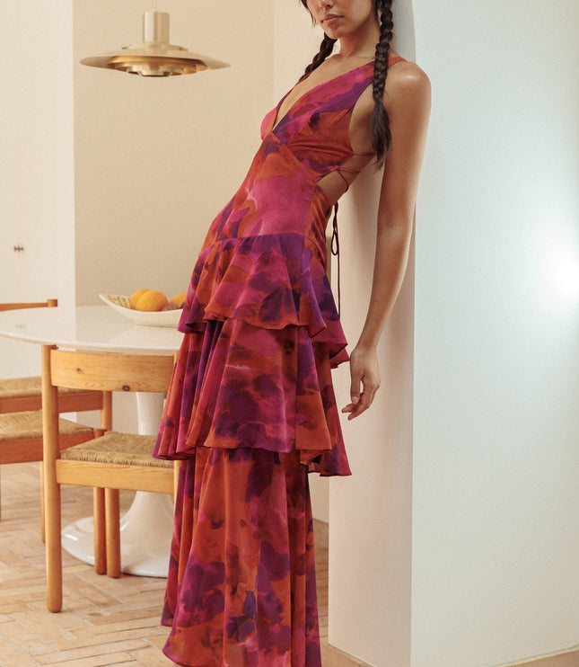 Red and purple floral tiered ruffle maxi dress with v-neckline side view