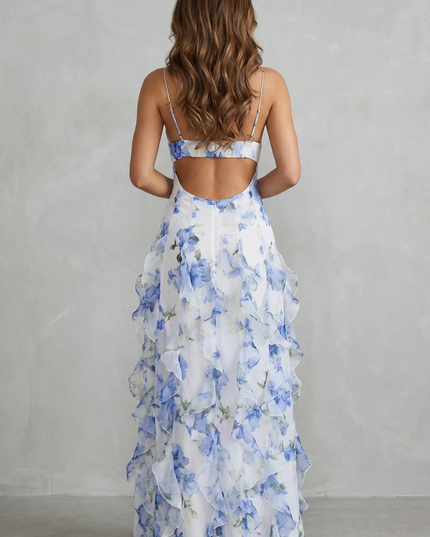 Back view of blue floral V neck maxi dress with open back and layered ruffles