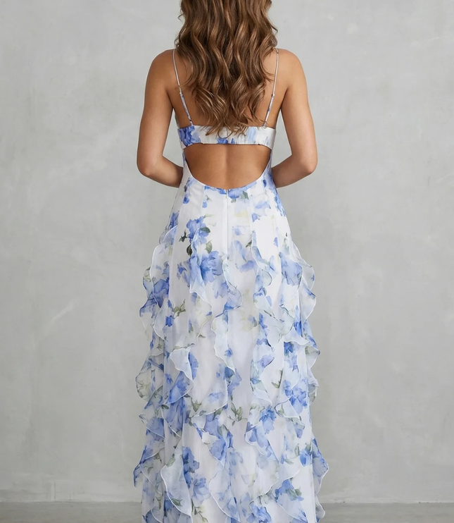 Back view of blue floral V neck maxi dress with open back and layered ruffles