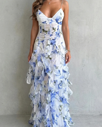 Blue floral V neck maxi dress with sheer layered skirt and straps, front view