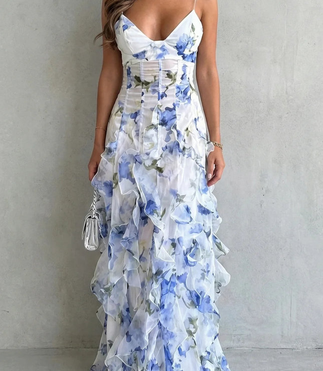 Blue floral V neck maxi dress with sheer layered skirt and straps, front view