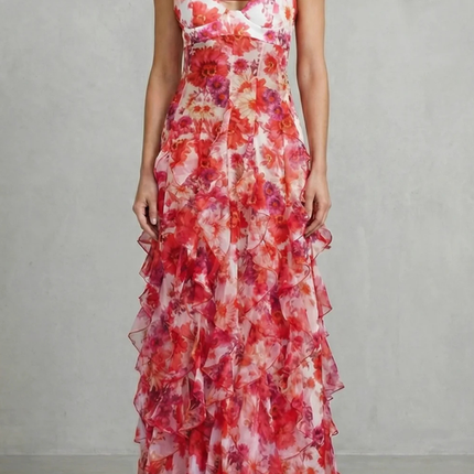Floral V neck maxi dress with red and pink ruffles, front view on model