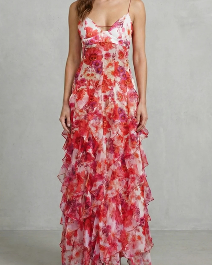 Floral V neck maxi dress with red and pink ruffles, front view on model