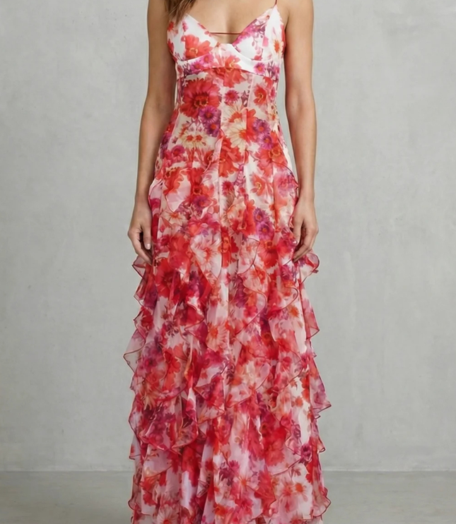 Floral V neck maxi dress with red and pink ruffles, front view on model