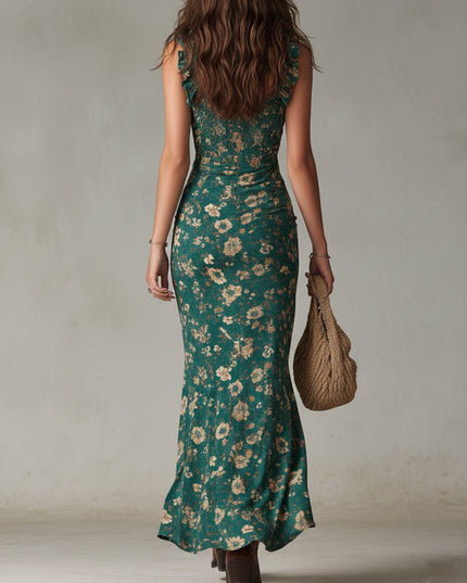 Back view of teal floral maxi dress for women with fitted silhouette and flowing hem