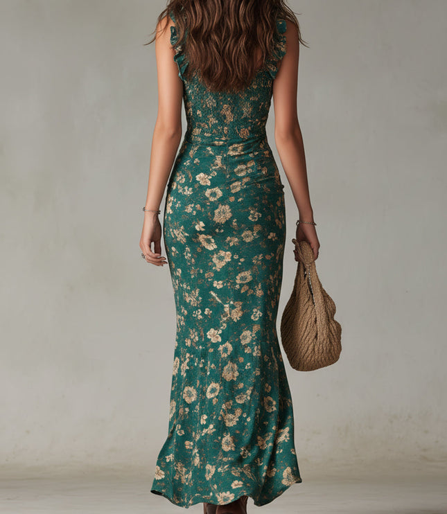 Back view of teal floral maxi dress for women with fitted silhouette and flowing hem