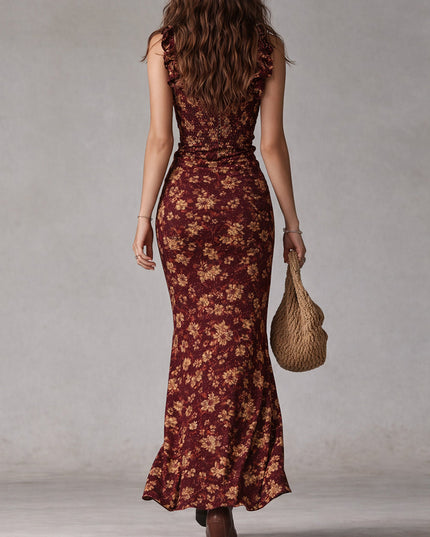 Back view of burgundy floral maxi dress with sleeveless fit and ankle-length hem