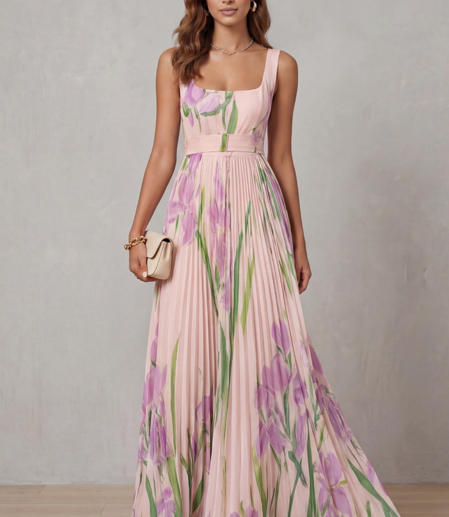 Front view of a pink floral wedding guest maxi dress with square neckline and flowing pleats
