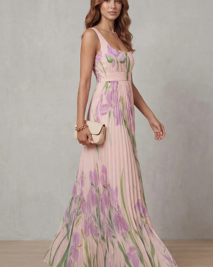 Side view of a pink floral square neck maxi dress showing sleeveless bodice and pleated skirt