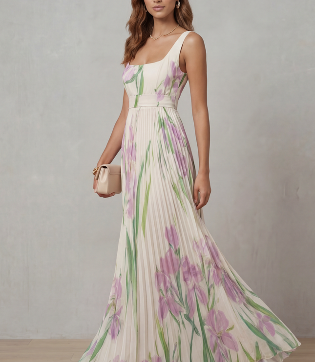 Side view of a sleeveless floral square neck maxi dress with flowing pleated skirt for wedding guest wear