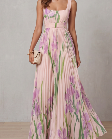 Front view of a pink floral square neck maxi dress with pleated skirt and waist belt