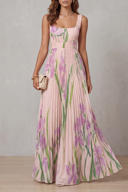 Front view of a pink floral square neck maxi dress with pleated skirt and waist belt