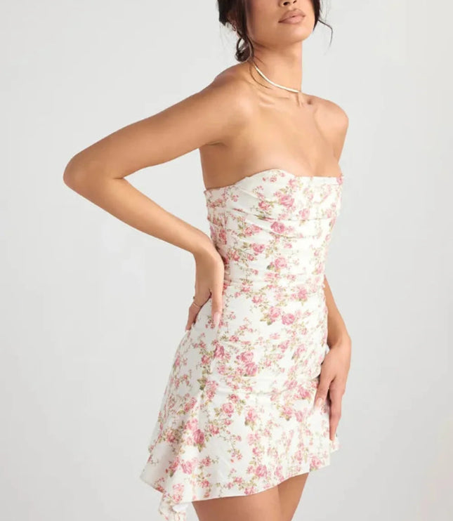 Side back view of a women's wedding guest floral strapless mini dress with fitted waist and flared skirt