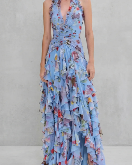 Blue floral halter maxi dress with deep V neckline and layered ruffle skirt, front view