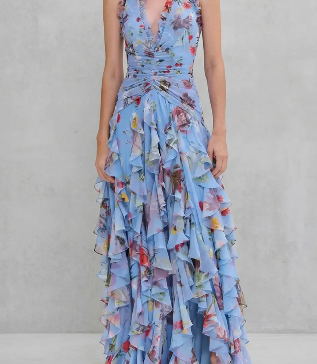 Blue floral halter maxi dress with deep V neckline and layered ruffle skirt, front view