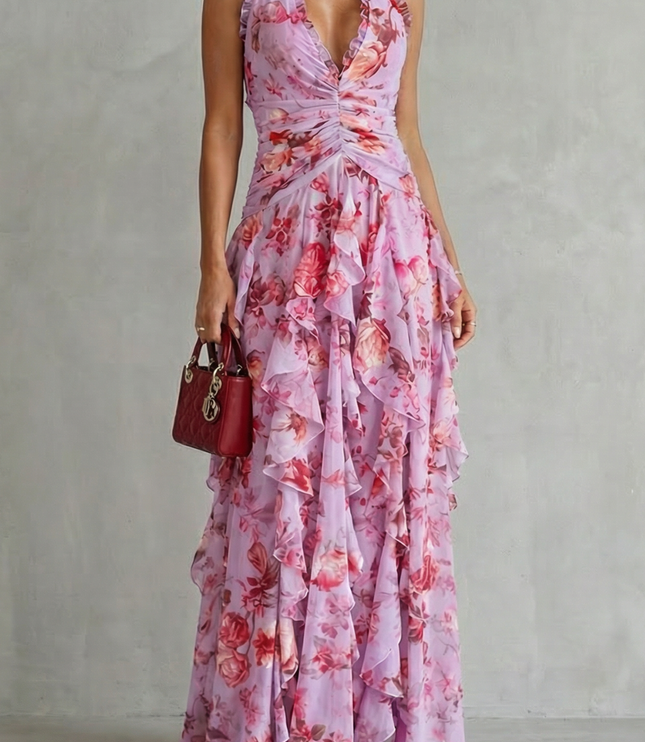 Pink floral halter maxi dress with ruched waist and layered ruffle skirt, front view