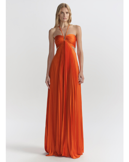 Bright orange halter maxi pleated dress with ruched bandeau bodice and side cutouts, front view