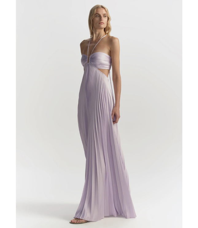 Lavender wedding guest halter maxi pleated dress shown at angle, highlighting pleated skirt drape