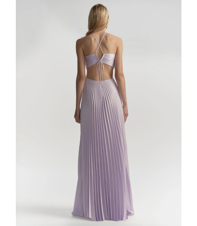 Back view of lavender halter maxi pleated dress with crisscross straps and tie back detail