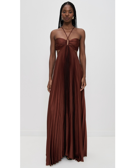 Front view of rust brown wedding guest halter maxi pleated dress with ruched bust and flowy skirt