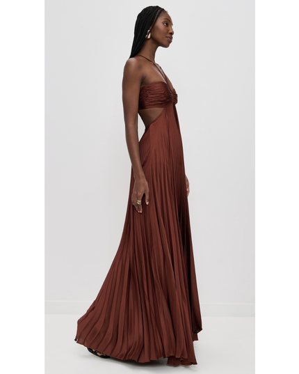 Side view rust brown halter maxi pleated dress showing waist cutout and draped full-length skirt