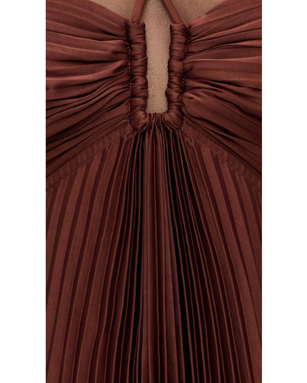 Detail of rust brown pleated maxi dress showing ruched center front keyhole and fine pleats