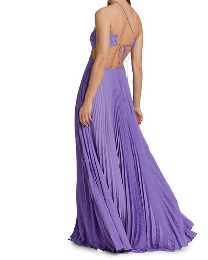 Back angled view purple halter maxi pleated dress with open back, crisscross straps, and tie closure