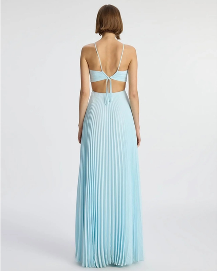 Back view of light blue halter maxi pleated dress with open back and tie detail