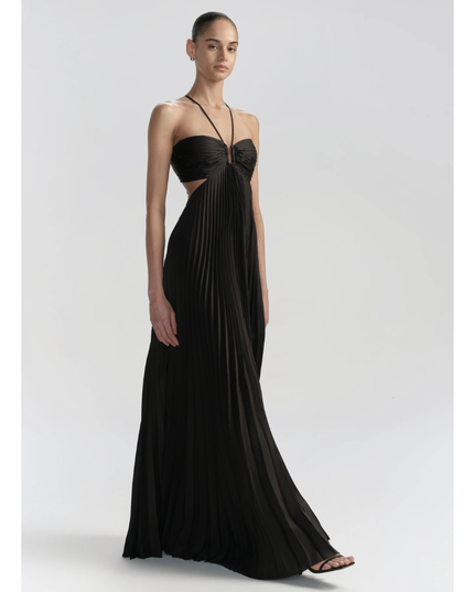 Black halter maxi pleated dress with cutout waist and ruched bust, full length front view