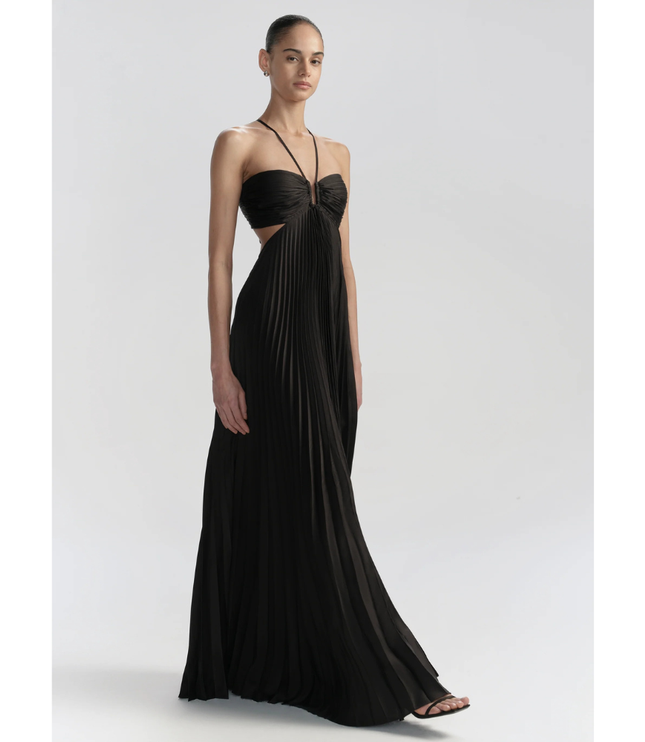 Black halter maxi pleated dress with cutout waist and ruched bust, full length front view