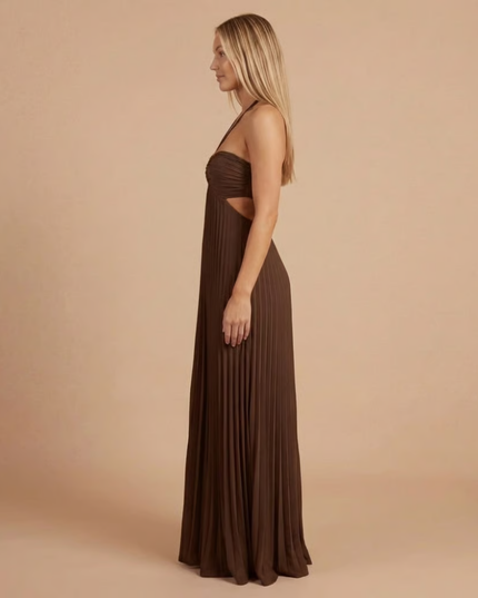Side profile of chocolate brown halter maxi dress with pleated details