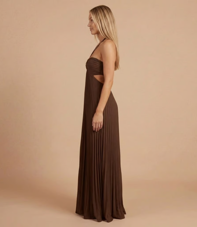 Side profile of chocolate brown halter maxi dress with pleated details