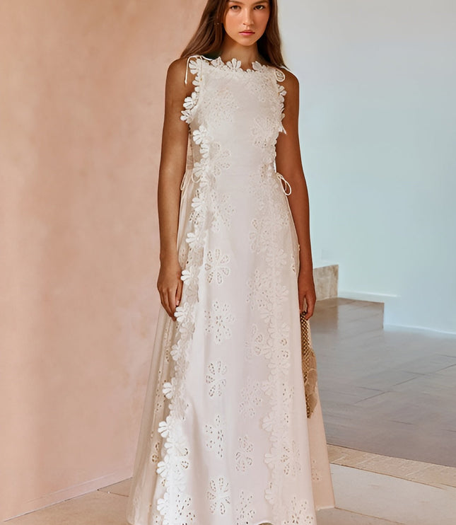 White eyelet lace maxi dress with ruffled trim and lace-up side detail