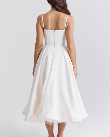 Back view of white midi dress with fitted bodice and full skirt