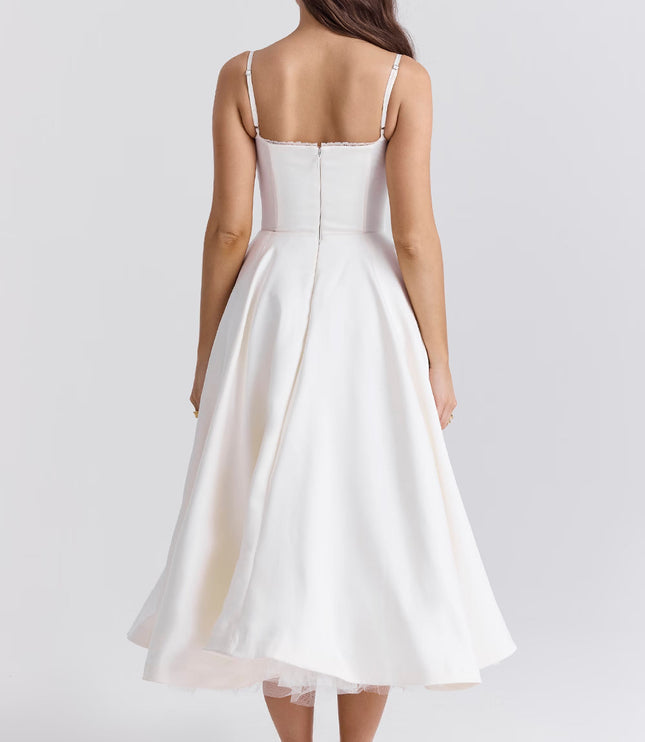 Back view of white midi dress with fitted bodice and full skirt