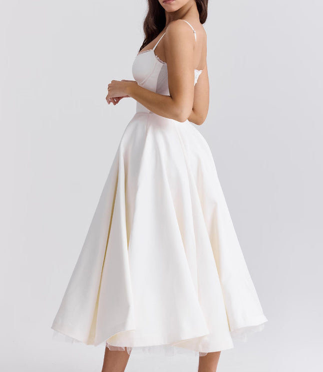Side view of white midi dress with open back and flared skirt