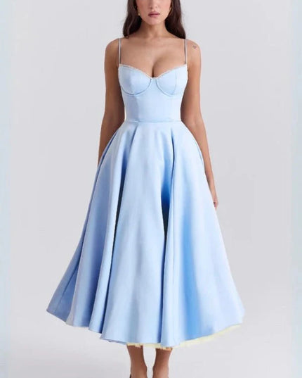 Light blue midi dress with fitted bodice and flared skirt for wedding guest