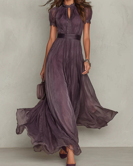 Purple keyhole maxi dress with lace trim, short puff sleeves, and flowing chiffon skirt