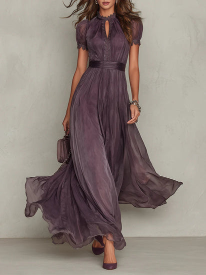 Purple keyhole maxi dress with lace trim, short puff sleeves, and flowing chiffon skirt