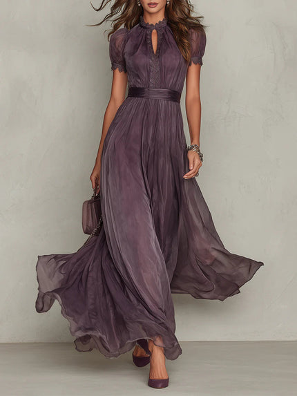 Purple keyhole maxi dress with lace trim, short puff sleeves, and flowing chiffon skirt