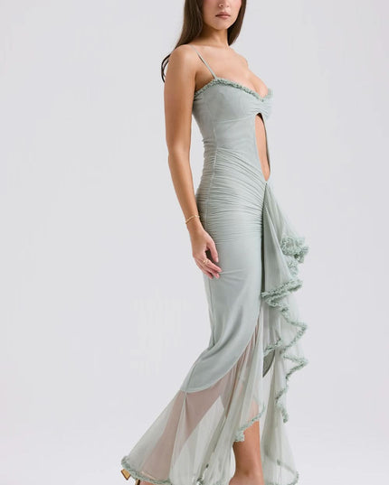Side view of sage sheer ruffle maxi dress with straps and high slit