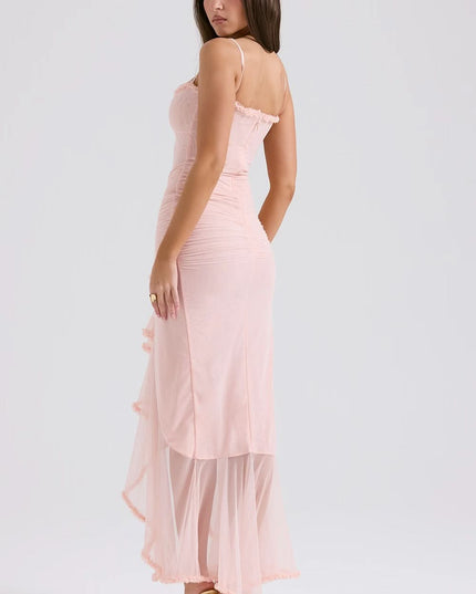Back view of blush pink sheer ruffle maxi dress with adjustable straps and sheer hem