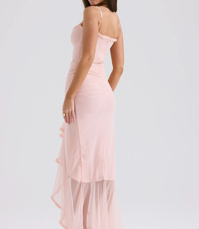 Back view of blush pink sheer ruffle maxi dress with adjustable straps and sheer hem