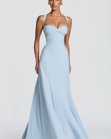 Side view of light blue maxi dress with fitted waist and full floor-length skirt
