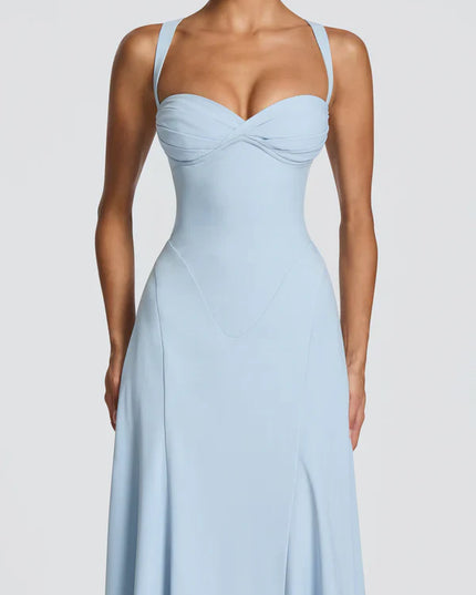 Back view of light blue maxi dress with crisscross straps and lace-up back detail